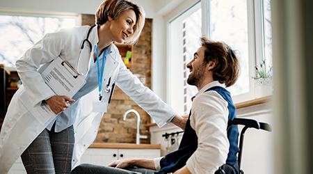 Nurse assisting patient with care. 