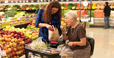 Caregiver assisting with shopping 